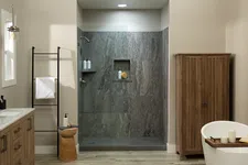 Thumbnail for Modern bathroom with wood vanity, freestanding tub, walk-in shower, wooden cabinet, and neutral decor.