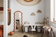 Thumbnail for Child playing with wooden train on the floor in a modern, neutral-toned kids' room with playful decor and natural light.