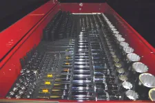 Thumbnail for Organized set of shiny metal sockets and screwdriver bits in a red toolbox drawer.