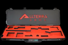 Thumbnail for Open black and red rifle case with foam cutouts for firearm components and Allterra Arms logo inside lid.