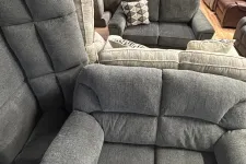 Thumbnail for a grey couch with pillows