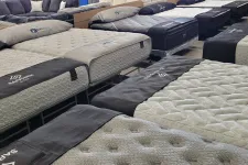 Thumbnail for a group of beds with white sheets