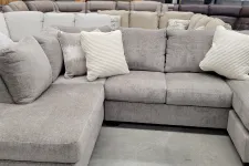 Thumbnail for a couch with many pillows