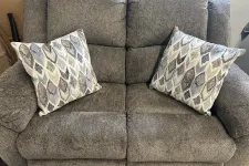 Thumbnail for a couch with a couple of pillows