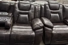 Thumbnail for a black leather couch