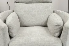 Thumbnail for a white couch with a black cord