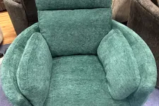 Thumbnail for a green couch with a cushion