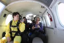Thumbnail for a group of people sitting in a plane