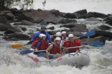 Thumbnail for a group of people on a raft in a body of water