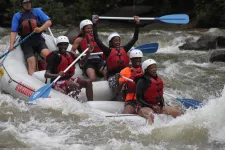 Thumbnail for a group of people on a raft in the water