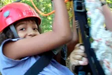 Thumbnail for a close up of a child wearing a helmet