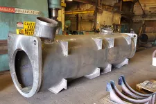 Thumbnail for a large metal tank in a factory
