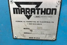 Thumbnail for Metal identification plate with Marathon logo and manufacturing details on a blue surface.