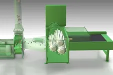 Thumbnail for Green industrial machine with gears processing material on a conveyor system in a clean environment.