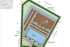 Thumbnail for Site plan showing two building phases with parking, green buffers, and a site location map in the corner