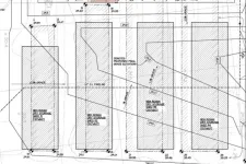 Thumbnail for Architectural site plan showing four proposed rectangular storage sheds with detailed measurements and annotations.