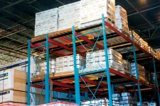 Thumbnail for Warehouse shelving filled with pallets of packaged products stacked high in an industrial storage facility