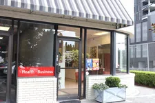 Thumbnail for Street view of Rosy Alterations shop with striped awning, glass door, and window displays in urban setting.