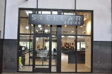 Thumbnail for Front glass entrance of Stellar Bodies fitness studio with visible interior workout equipment and signage