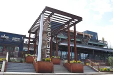 Thumbnail for Exterior view of The Works building with modern architecture and outdoor staircases under clear sky