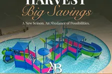 Thumbnail for Colorful water play structure in a pool promoting Salacoa Harvest Big Savings homes by Artisan Built Communities.