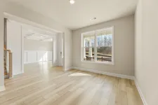 Thumbnail for a room with a wood floor and a window