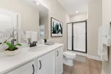 Thumbnail for a bathroom with white cabinets