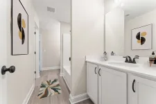 Thumbnail for a bathroom with white cabinets