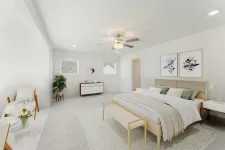 Thumbnail for a large bedroom with a bed and a fan