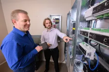 Thumbnail for men working in a server room