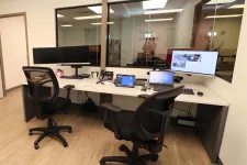 Thumbnail for a desk with a chair and computers