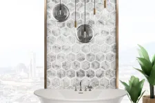 Thumbnail for a white bathtub with a light fixture above it