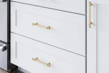 Thumbnail for a white dresser with a gold handle