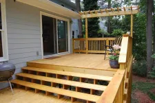 Thumbnail for a deck with a wood railing and a wood deck with a wood railing