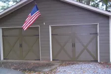 Thumbnail for a garage door with a flag on top