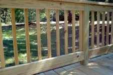 Thumbnail for a wooden deck with a railing
