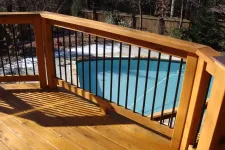 Thumbnail for a wooden bridge over a pool
