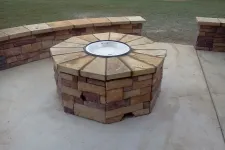 Thumbnail for a brick oven on a brick patio
