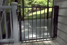 Thumbnail for a glass door with a metal railing