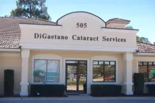 Thumbnail for Front view of DiGaetano Cataract Services building with beige facade and large windows.
