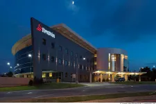 Thumbnail for a building with a sign on it