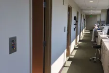 Thumbnail for a hallway with a desk and chairs