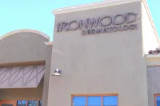 Thumbnail for Exterior view of Ironwood Dermatology building with clear blue sky and visible windows and signage.