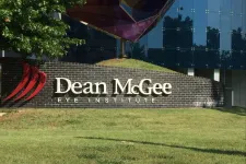 Thumbnail for a sign in front of a building
