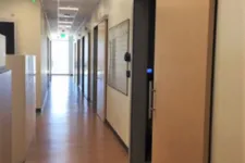 Thumbnail for a long hallway with doors