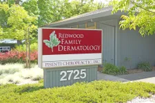 Thumbnail for Outdoor sign for Redwood Family Dermatology and Pisenti Chiropractic with address 2725, surrounded by greenery.