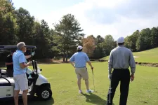 Thumbnail for a group of men playing golf