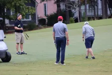 Thumbnail for a group of men playing golf