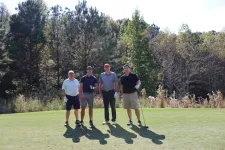 Thumbnail for a group of men on a golf course