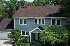 Thumbnail for a house with a red roof with Thomas Paine Cottage in the background